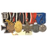 An Imperial German/ Third Reich medal bar of 6 medals: 1914 Iron Cross 2nd class with 1939 bar (