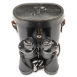 A good Third Reich 7x50 naval binocular, marked with eagle over “M”, maker’s code “beh” (E Leitz,