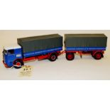 A Paul’s Model Art / Minichamps 1961 Bussing LU 11/16 6 wheeled truck and drawbar trailer. In dark