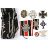 Third Reich medals and badges: 1939 Iron Cross 1st Class, the back stamped “L59”, War Merit Cross