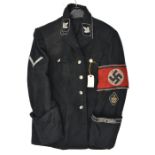 A Third Reich black tunic, with beaded silver buttons and SS insignia, comprising collar patches