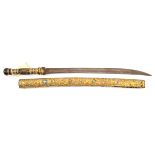 A bazaar quality dha, curved blade 17”, the hilt and scabbard covered with thin gilt sheet metal