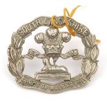 An all WM cap badge of the 4th Bn S Lancashire Regt, blank scroll. GC