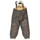 A pair of USAAF sheepskin flying trousers, with external pockets to the front of each leg and