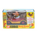 A Corgi Toys Basil Brush and his car (808). Car in yellow and red, with soundbox and 2 laugh