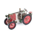 An interesting and impressive Meccano clockwork tractor. Based around the large heavy-duty clockwork