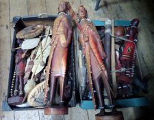 A large quantity of African tourist souvenir painted wooden figures (Masai?), ebony busts,