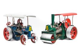 2 Wilesco Live Steam Engines. A Road Roller (D365) in green and silver and a Traction Engine (