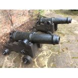 A pair of early 19th century 6 pounder iron Carronades, 43” overall, breeches embossed with a