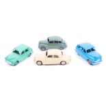 4 Dinky Toys. Austin Devon in suede green with suede green wheels. Rover 75 in cream with cream