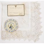 An invitation card dated Friday 28th Nov 1941 from the Fuhrer and Reichschancellor; a white linen