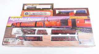 A Hornby Railways Train Set and 3 additional locomotives. Set R758 ‘Night Mail Express’