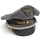 A composite Luftwaffe officer’s peaked cap.QGC