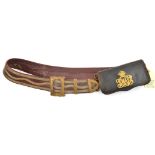 An RE officer’s Russia leather shoulder belt, triple gilt embroidered lines, engraved buckle, tip