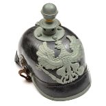 A WWI Prussian Artillery enlisted man’s Kugelhelm, with leather skull and all grey metal fittings,