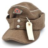 A German RAD officer’s khaki ski cap, with silver piping and woven badge, the lining stamped with