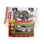 12 plastic motor racing kits by Tamiya, Heller, Hasegawa, etc. 1:12 scale; McLaren MP4/6 Honda,