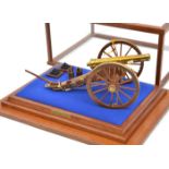 A well made model of a Napoleonic War period 6 pdr field gun, mahogany carriage, brass barrel,