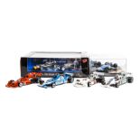 A small quantity of competition cars in various scales, 1:43, 1:24, etc. By Quartzo, Brumm,
