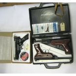 A .177” Webley Tempest air pistol, GWO & near VGC, in its polystyrene lined carton with tin of