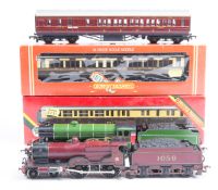 A quantity of OO railway by various makes including Hornby, Tri-ang, Bachmann etc. 4 tender