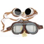 A pair of RAF type flying goggles, elasticated strap; and a pair of Italian (?) small darkened