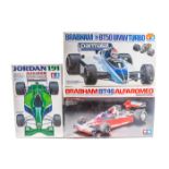 12 plastic motor racing kits by Tamiya, Modeler’s, Revival, Mitsuwa, Bandai, etc. 1:20 scale; Alfa