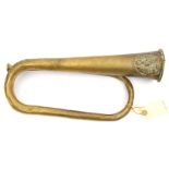 A Russian 19th century brass bugle, probably Crimea era, bears applied Russian coat of arms, 15½” in