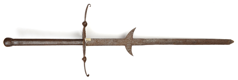 A 19th century copy of a 16th century 2 handed sword, blade 46”, large pierced crossguard, heavy