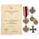 Third Reich medals: 3 War Merit crosses, 2nd class with swords, one with ribbon; another, without