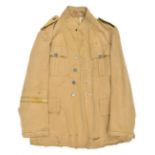 A Third Reich lightweight tropical tunic, of pale tan cotton fabric, with a mixture of grey and