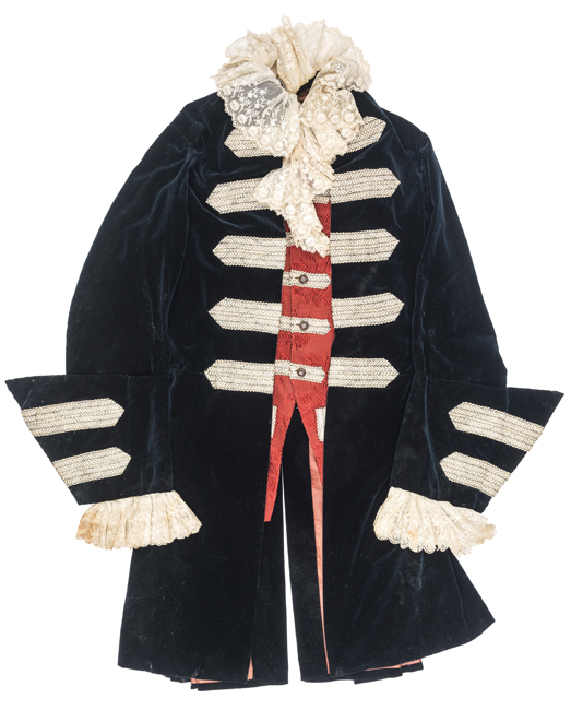 A Georgian gentleman’s frock coat, the dark blue velvet coat with five pairs of 2” wide silver