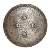 A 19th century Indian shield dhal, lightly chiselled on the outer panel with antelope, boar,