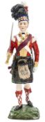 A well modelled painted Sitzendorf porcelain figure “Seaforth Highlanders 1815”, officer in full