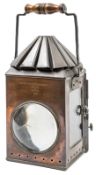 A rare gunpowder magazine copper lantern, of oblong form with fluted conical safety top, front lens,