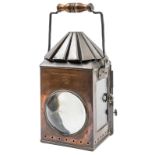 A rare gunpowder magazine copper lantern, of oblong form with fluted conical safety top, front lens,