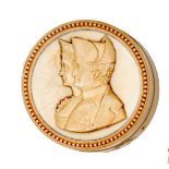 An early 19th century ivory trinket box, Napoleon and Josephine, of circular form, diameter 60mm,