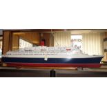 An impressively large-scale model of the Cunard Liner QE2. A well-proportioned wooden model