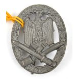 A Third Reich General Assault badge, solid back grey metal with round pin, by “f.o” (Friedrick