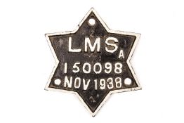 An LMS cast iron railway rolling stock builder’s plate. ‘A 150098 November 1938’. A 6-pointed star
