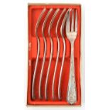 A set of 6 silver plated cake forks, the handles impressed with Luftwaffe eagle, “Fl. U” and “1935”,