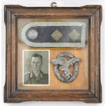 A Third Reich Luftwaffe Observer’s badge, an epaulette with 2 pips and yellow piping and a