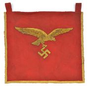 A Third Reich Luftwaffe single sided trumpet banner, of coarse red material with heavy gold