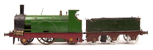 A scratch built gauge 3 (2.5" gauge) live steam 2-2-2 tender locomotive. Built by W. Briggs. This
