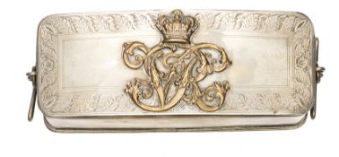A Victorian Hussar officer’s silver plated pouch flap, bearing brass crowned VR cypher, forming