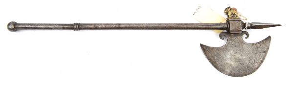 A small Indian axe, swollen crescent shaped blade 5½”, with faint traces of decoration, into