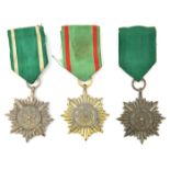 Three Third Reich “Ostvolk” medals, 2nd class in bronze, silver (oxidised to dull grey), and gilt (