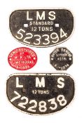4 Railway cast iron wagon builders plates. A LMS standard 12 tons, 523394. A LMS 12 tons, 722838.