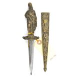 A 19th century Romantic dagger, short DE blade 3¾”, heavy cast brass hilt, in the form of a standing