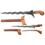 A kris, deepy fullered wavy blade 15”, small cap to facetted grip (worn) no scabbard; another